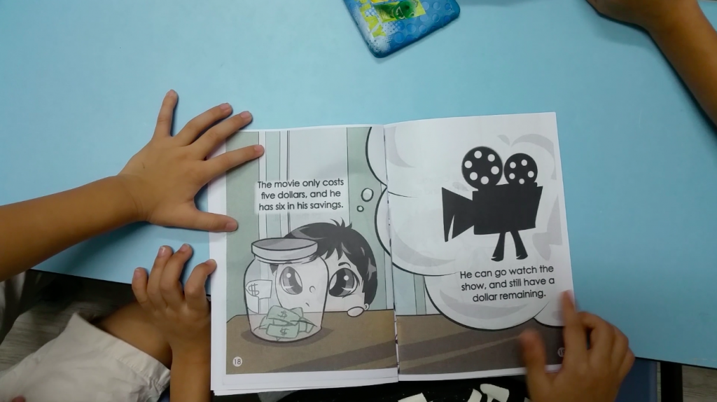 The kids reading about  "Let's Meet Committed Conrad" story